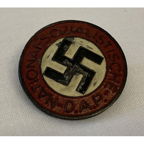 41 - A German WWII style ersatz (economy issue) N.S.D.A.P. pin back badge. With markings to reverse. Appr... 