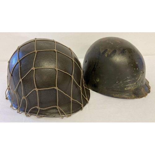 69 - A WWII style US M1 helmet with Capac liner and string cam net. Front seam swivel bale (loops missing... 