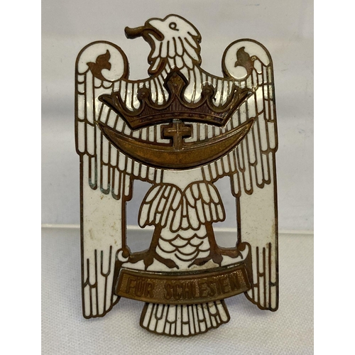 8 - A German badge in the style of the Interwar period Silesian Eagle 1st class. White enamelled detail.... 