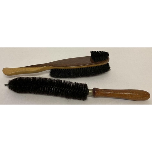 82 - 2 vintage wooden handled uniform brushes, one stamped 