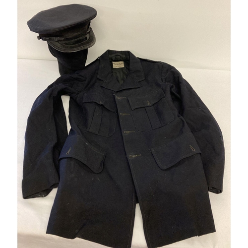 84 - A vintage RSPCA blue uniform jacket and cap. Black oak leaf band and Bakelite buttons to cap. Jacket... 