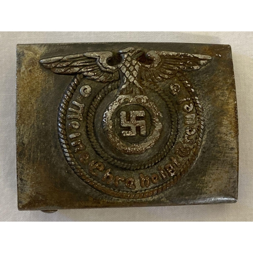 92 - A German WWII style Waffen SS metal belt buckle.