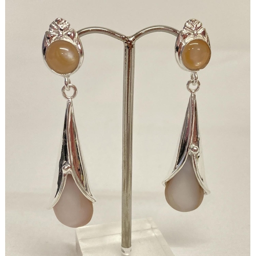 1015 - A pair of Art Nouveau style silver and pearl set earrings. Stamped 925. Approx. 5.5cm drop.