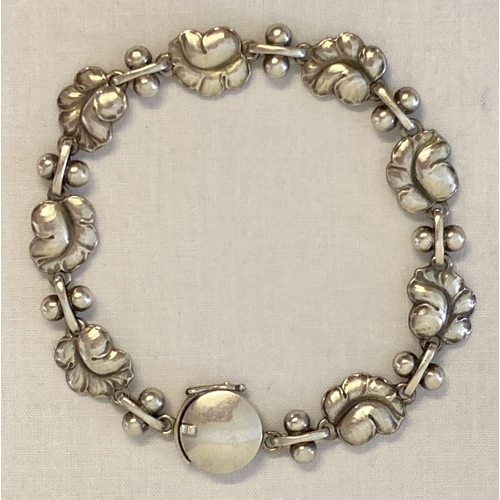 23 - A vintage Georg Jensen silver bracelet with leaf link design, #96. Fully hallmarked to back of clasp... 