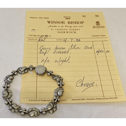 23 - A vintage Georg Jensen silver bracelet with leaf link design, #96. Fully hallmarked to back of clasp... 