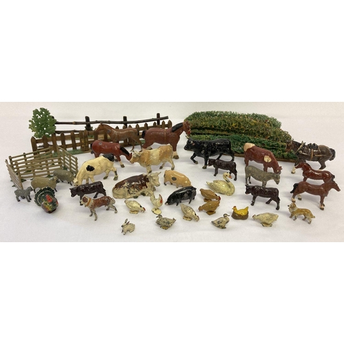 24 - A quantity of assorted vintage lead farm animals to include Britains and J. Hill & Co. Together with... 