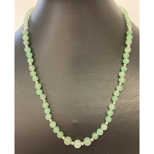 1052 - A green aventurine round beaded necklace with white metal spacer beads and T bar clasp.  Approx. 18