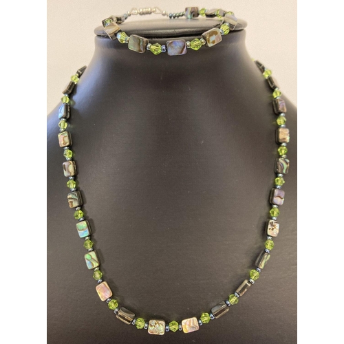 1074 - A matching abalone and crystal beaded necklace and bracelet. Necklace approx. 18