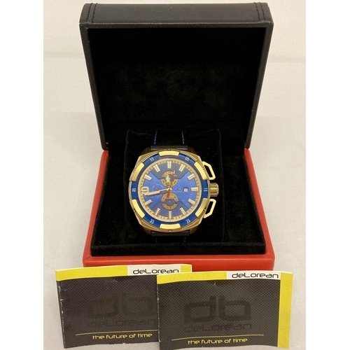 1101 - A men's DeLorean DL05-1062 automatic chronograph wristwatch, complete with box. Gold tone stainless ... 