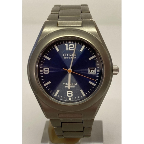1104 - A Citizen Eco Drive Titanium automatic wristwatch with stainless steel case and strap. Blue face wit... 