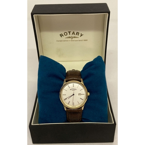 1107 - A men's rotary Windsor wristwatch with gold tone case and brown leather strap. Cream dial with black... 