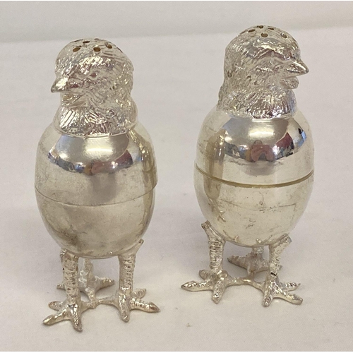 1114 - A silver plated screw top salt & pepper cruet in the form of hatching chicks.  Each approx. 7.5cm ta... 