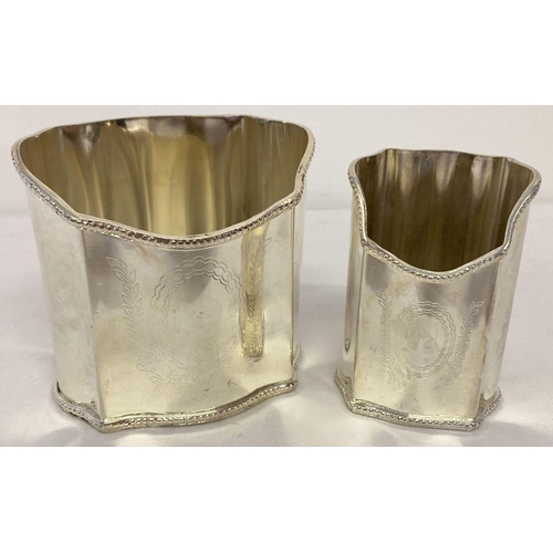 1115 - 2 matching silver plated pen holders with shaped rims and engraved detail to fronts.  Approx. 11cm t... 