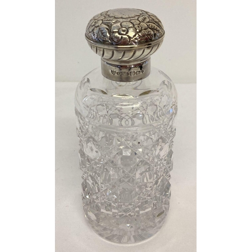 1125 - A modern silver topped glass scent bottle with floral design to lid. Fully hallmarked for Birmingham... 