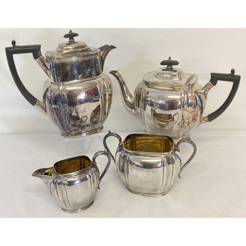1126 - A vintage 4 piece silver plated tea set by Joseph Rodgers and Sons, Sheffield. With wooden handles a... 