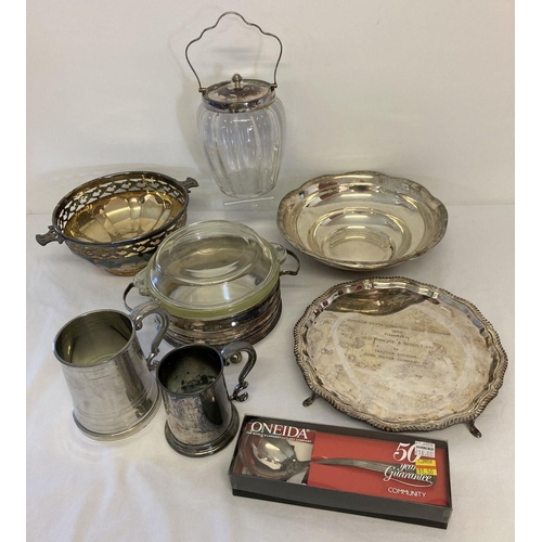 1129 - A small collection of vintage silver plated table wear. To include a biscuit jar, serving bowls and ... 
