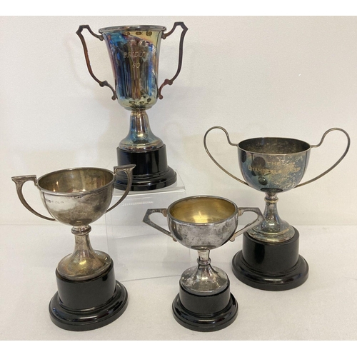 1130 - A small silver trophy cup on a black plastic stand hallmarked Birmingham 1932. Together with 3 silve... 