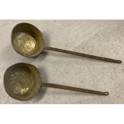 1149 - 2 vintage brass long handled pans.  Total length. 66cm, diameter approx. 22cm.