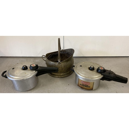 1153 - A vintage brass coal bucket together with 2 vintage Prestige pressure cookers. Coal bucket has hamme... 