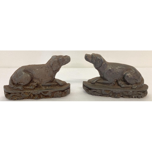 1154 - 2 vintage cast iron, small doorstops of dogs.  Approx. 10cm x 15cm.
