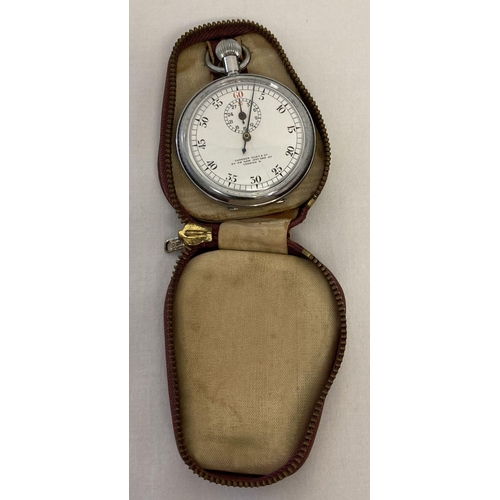 1162 - A vintage cased stop watch by Camerer Cuss & Co. London with inscription to back. Complete with red ... 