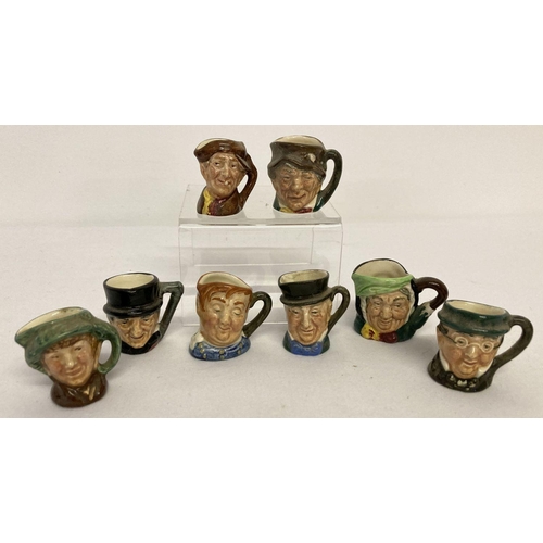1178 - A collection of 8 miniature Royal Doulton ceramic toby jugs.  Tallest approx. 3.5cm tall.