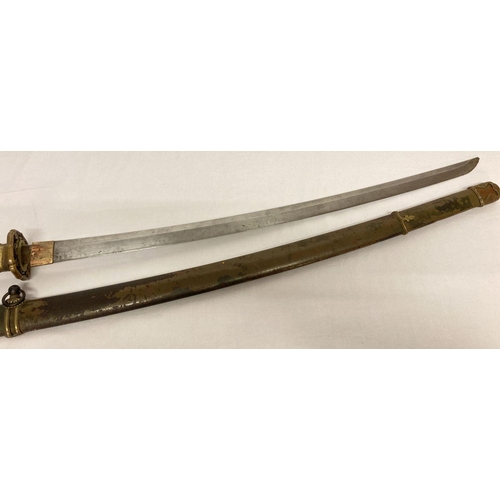 1209 - A 1936 Japanese Samurai sword and scabbard with a Ray skin handle, bronze mounts and a signed blade.... 