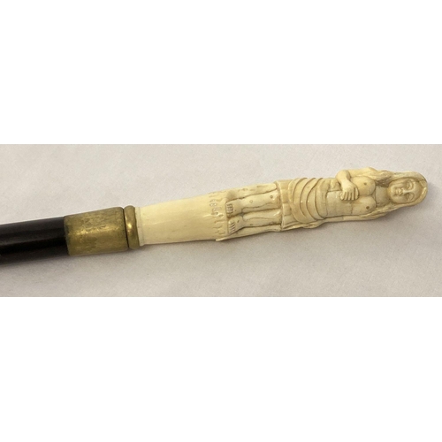 1266 - A bone topped walking cane with screw in finial in the form of a woman.  Approx. 93cm long.