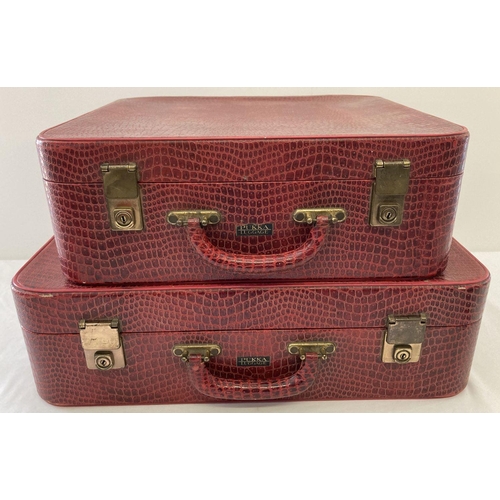 1270 - A matching vintage mock crocodile effect 2 piece luggage set by Pukka, in red. Small suitcase and ov... 