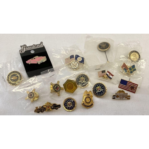 1298 - A collection of assorted American Agency themed pin badges. To include: United States Secret Service... 