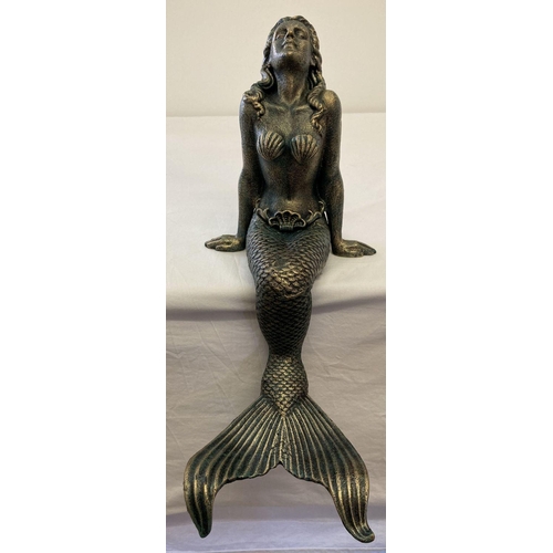 1340 - A large cast metal figurine of a mermaid in a seated position. Ideal pond ornament. Approx. 42cm tal... 