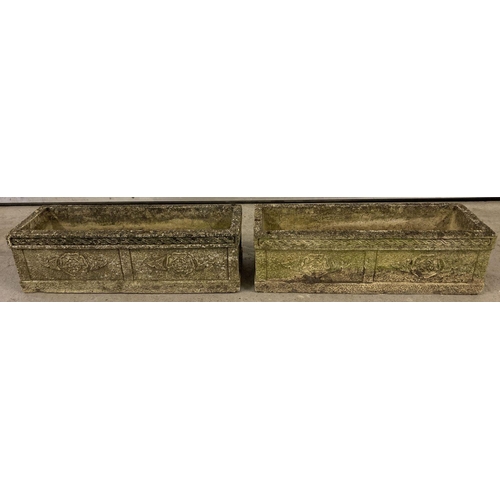 1343 - A pair of rectangular trough Cotswold Studios U27 stone planters with carved rose detail to sides.  ... 