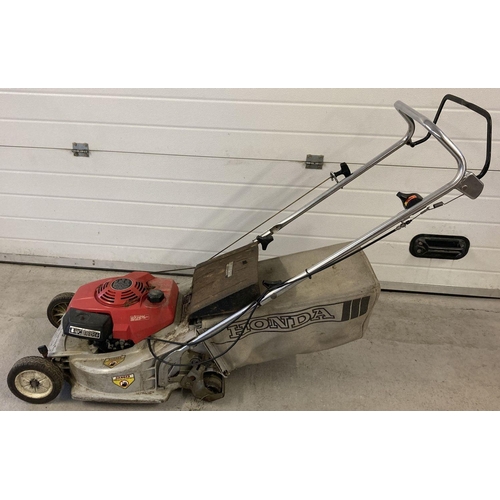 1347 - A Honda HR173 petrol lawnmower with grass collection basket. Not tried and tested.