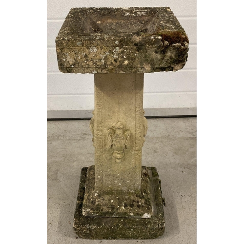 1354 - A square shaped 3 sectional pedestal style stone bird bath with carved urn detail to all four sides.... 