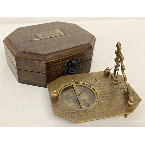 1265 - A brass sundial compass, marked 