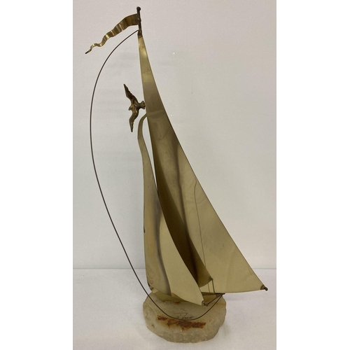 1 - A mid 20th century brass sail boat sculpture by John & Don DeMott with flag and seagull detail. On a... 
