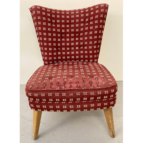 42 - A retro mid century unholstered low easy chair with light wood tapered & splayed legs. Red and cream... 