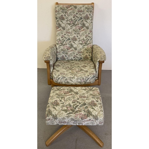 54 - An Ercol light wood framed swivel/reclining easy chair and matching footstool. Both with floral & hu... 