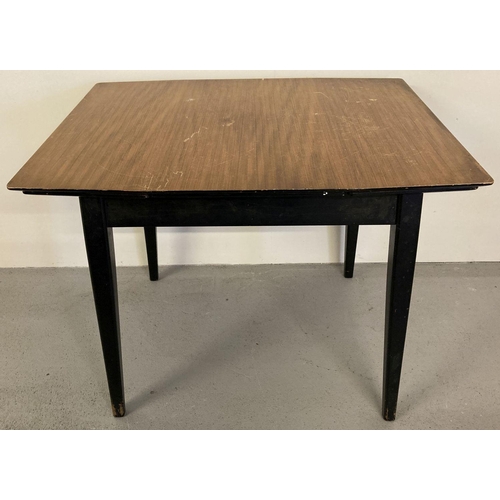 75 - A vintage 1960's teak draw leaf kitchen table with veneered top and with ebonised legs and frame.  A... 