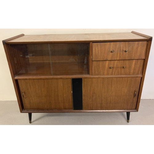 77 - A 1960's teak sideboard with sliding door cupboards, drawers and glass panels.  Approx. 94cm tall x ... 