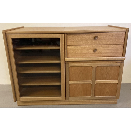 82 - A vintage Nathan teak unit, #5104 Home Entertainment Unit Features lift up top, glass fronted door s... 