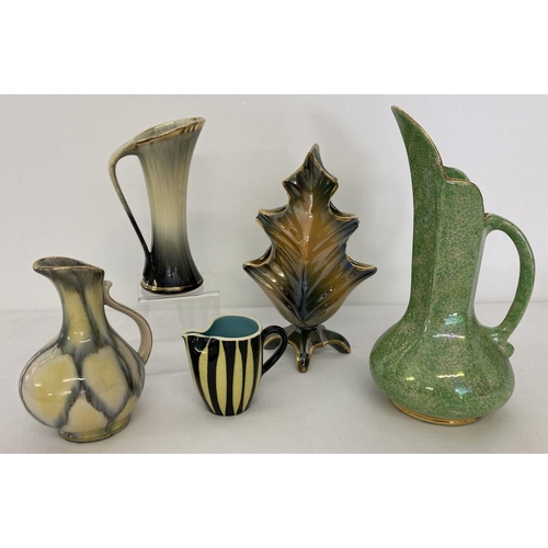 9 - A collection of Art Deco and Mid Century pottery jugs and a vase. To include green speckled glaze Go... 