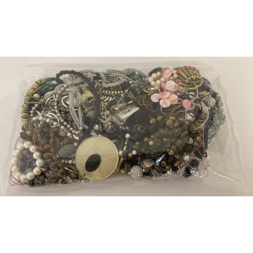 1021 - A sealed bag of mixed modern costume jewellery to include statement necklaces and bracelets.  Approx... 