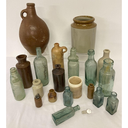 1204 - A collection of vintage stone ware bottles & jars together with a quantity of vintage glass bottles.... 