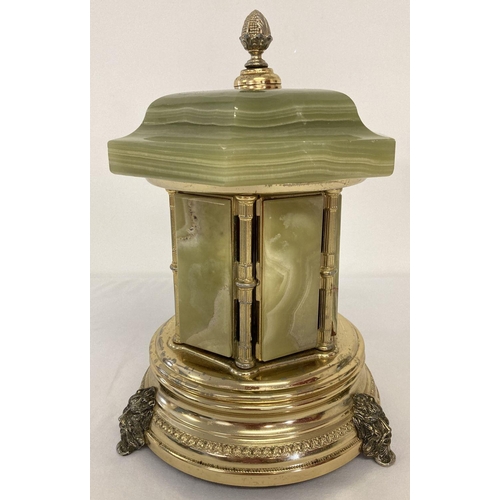 A green onyx and metal musical cigarette holder with revolving sections by  Brevettato. Finial to top