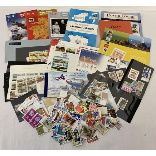 178 - A quantity of Jersey & Guernsey stamps and stamp related ephemera. To include: first day covers, iss... 