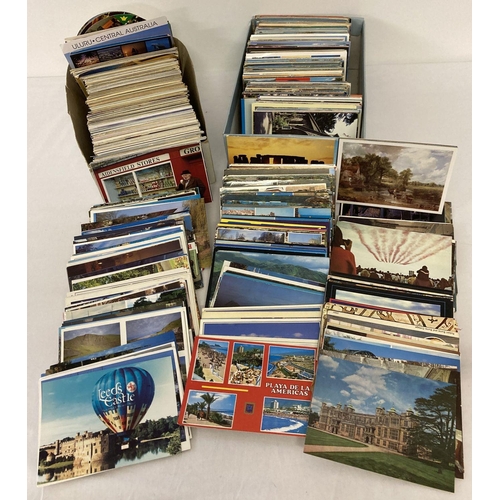 355 - 2 boxes of vintage and modern postcards. To include holiday destinations, landscapes and museums.