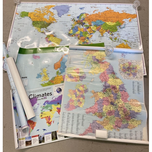 328 - A collection of poster sized laminated wall maps of The World, Europe and The British Isles.