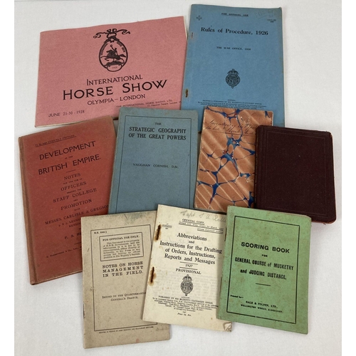 331 - A collection of vintage military issue booklets together with a 1928 International Horse Show progam... 