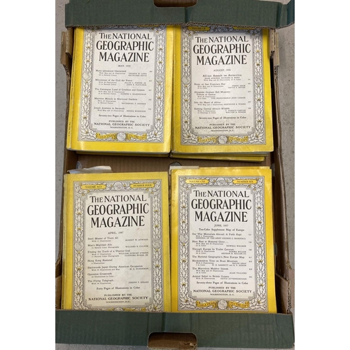 222 - A box of 32 assorted vintage issues of The National Geographic magazine. Dating from 1930 to 1993.